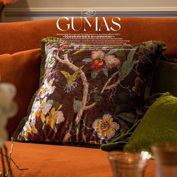 Burgundy velvet throw pillow cover with embroidered hummingbirds and botanical flowers in cream and gold