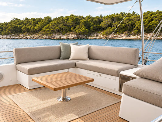 Custom gray cushions on an L-shaped boat cockpit lounge