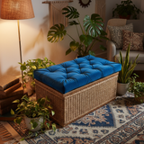 24x24 deep seat outdoor cushions in a vibrant patterned fabric in a sunny outdoor setting.