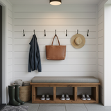 Navy 42x20 bench cushion displayed in a serene outdoor garden.