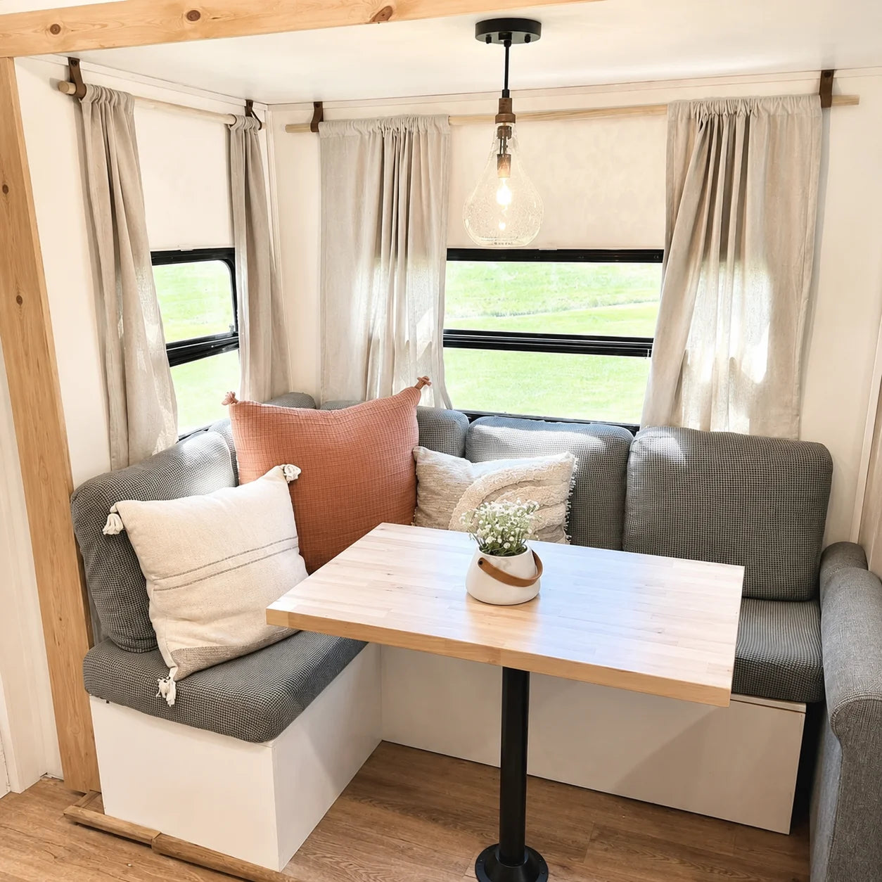 Custom gray corner RV dinette cushions for a camper booth