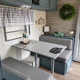 Custom gray RV dinette cushions for a farmhouse camper booth