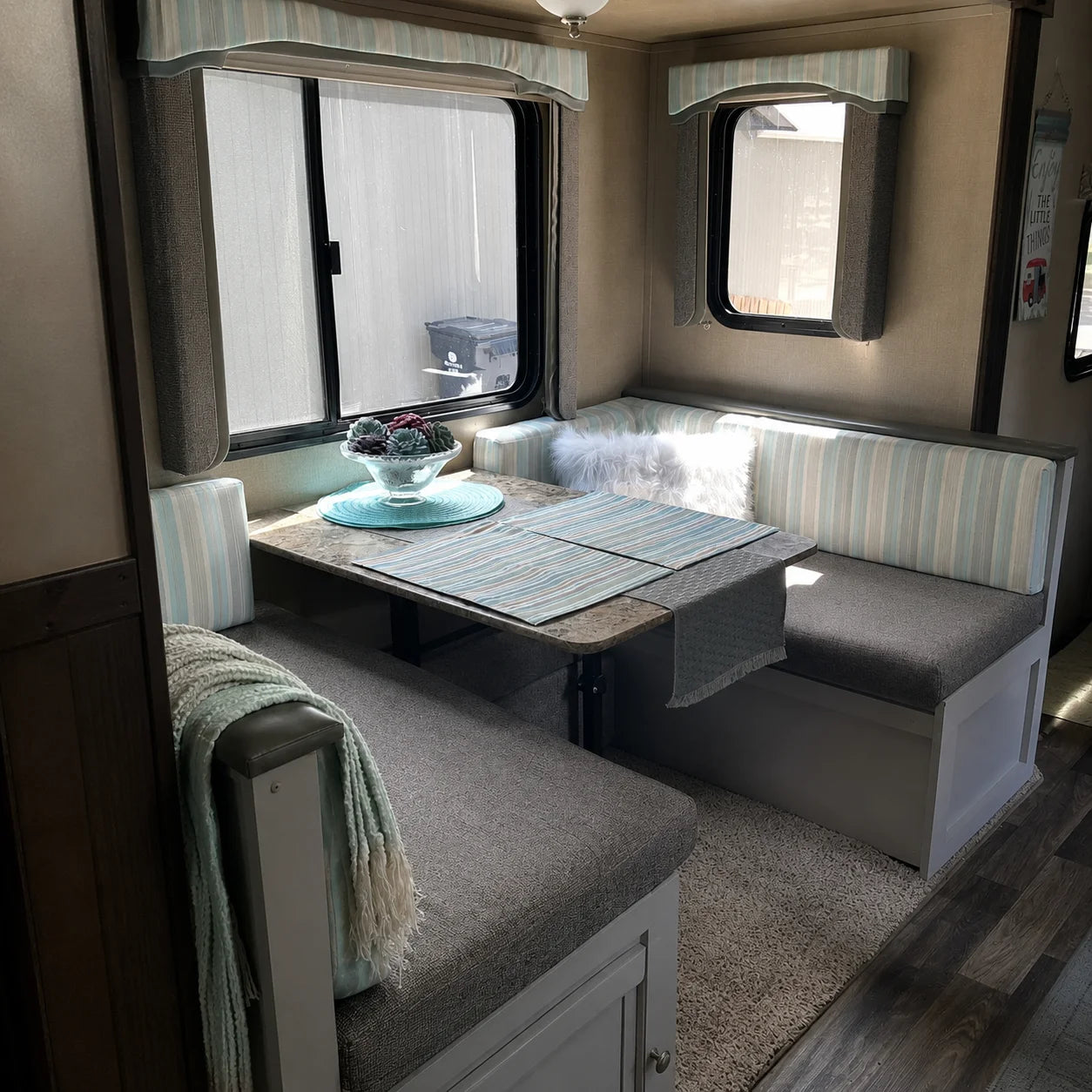 Custom gray RV dinette cushions for a travel trailer booth