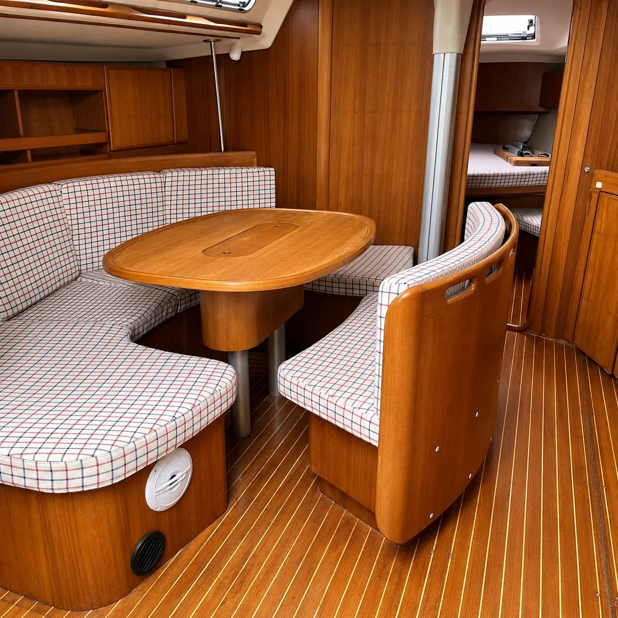 Custom plaid boat dinette cushions for classic cabin seating