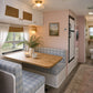 Custom plaid RV dinette cushions for a travel trailer booth