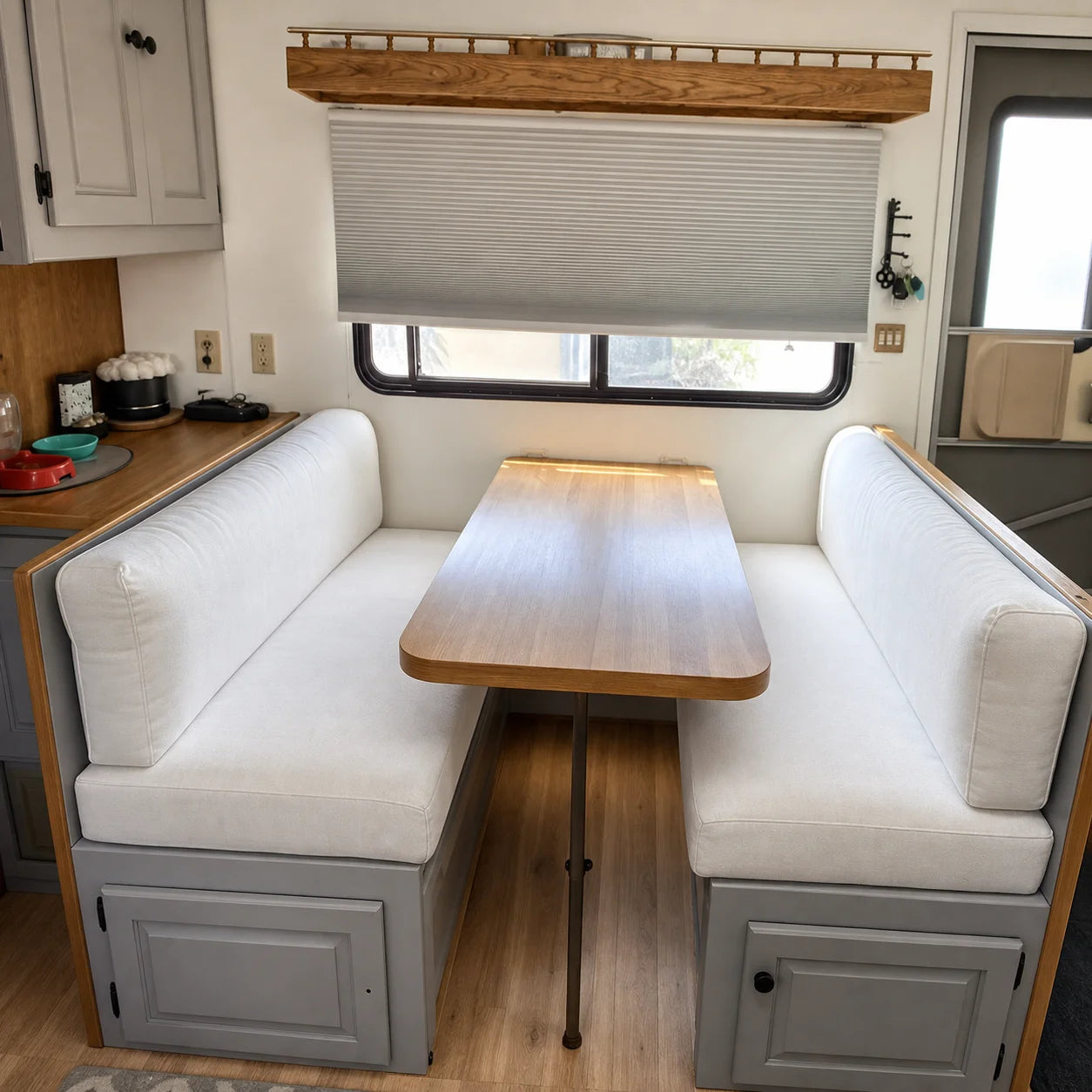 Custom white RV booth cushions for camper dinette seating