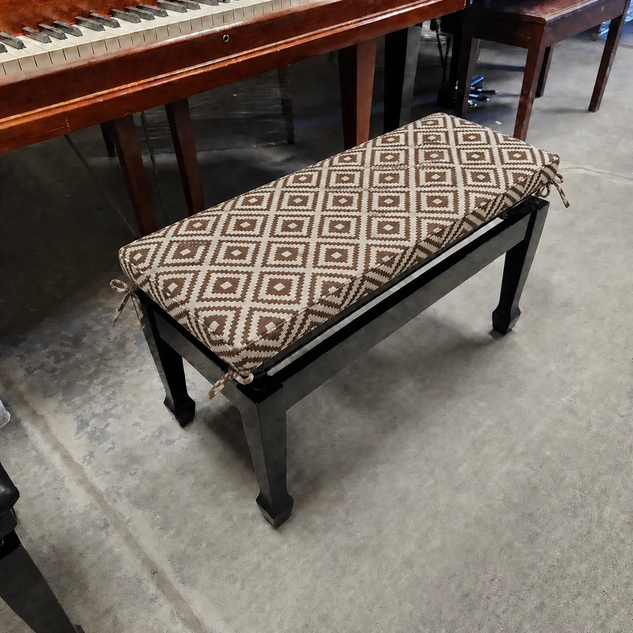 Custom piano bench cushion in dark fabric – exact fit replacement pad
