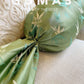 bamboo jacquard bolster tied end close up green