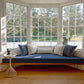Custom navy bay window seat cushions on a built-in bench