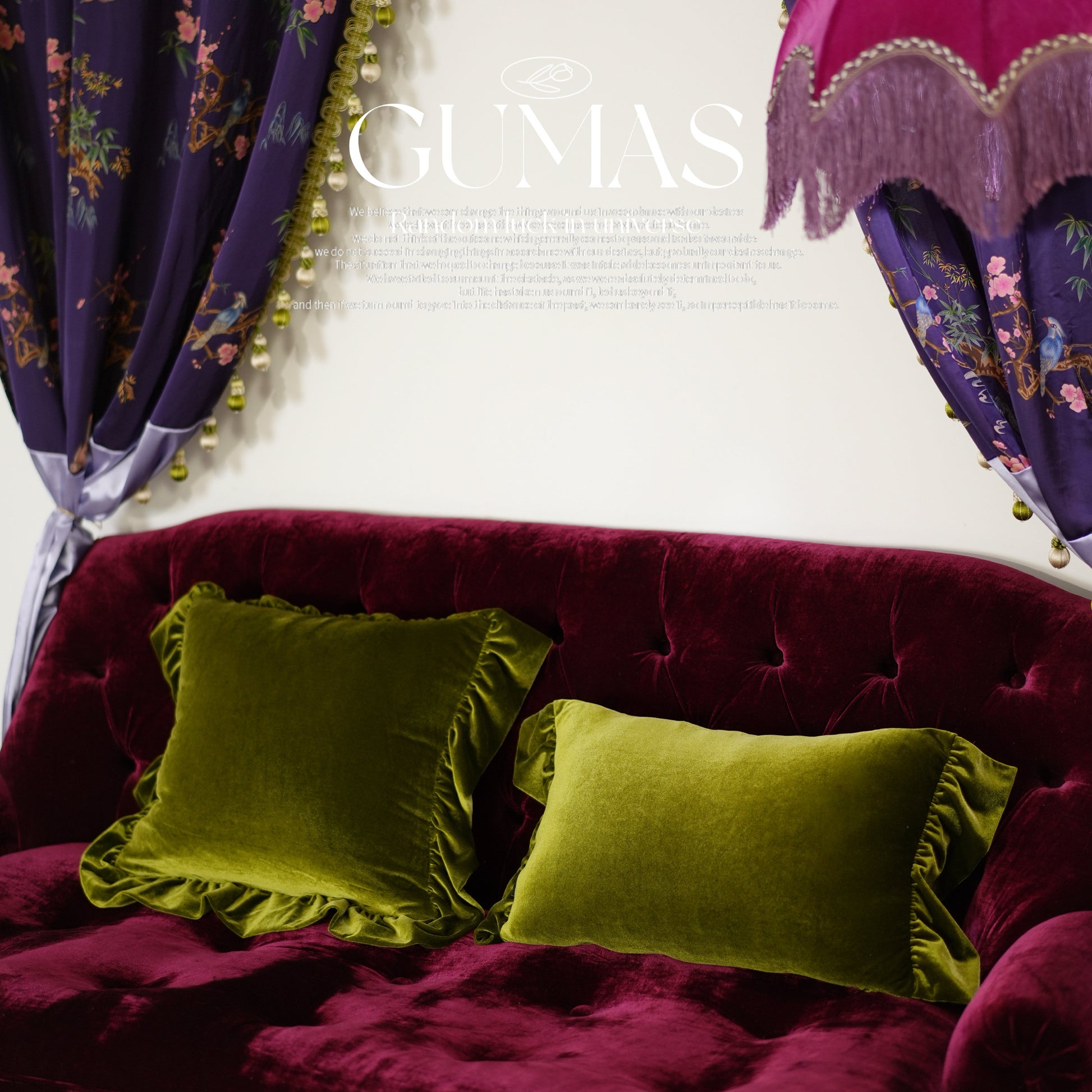 Burgundy red velvet pillow with ruffle trim on sofa styling