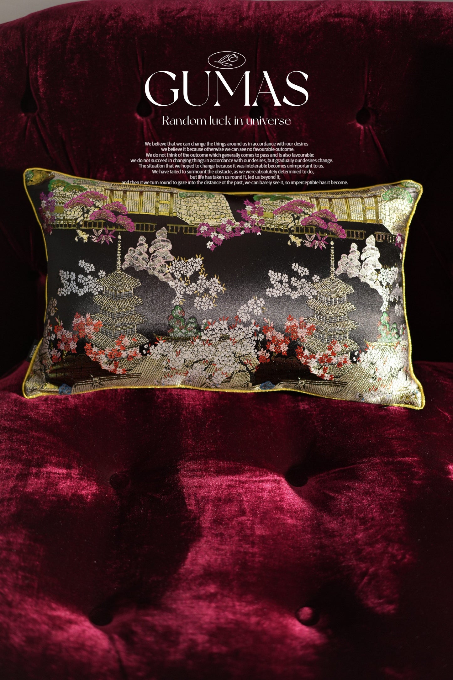 Chinoiserie pillow cover with gold tassel trim and black accent border on wine red velvet base