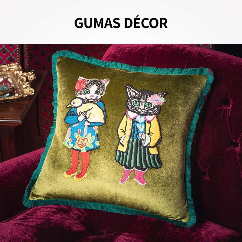 Close-up of 3D raised embroidery cat design on velvet pillow cover