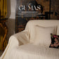 Close-up of botanical floral design on black crushed velvet pillow with subtle sheen
