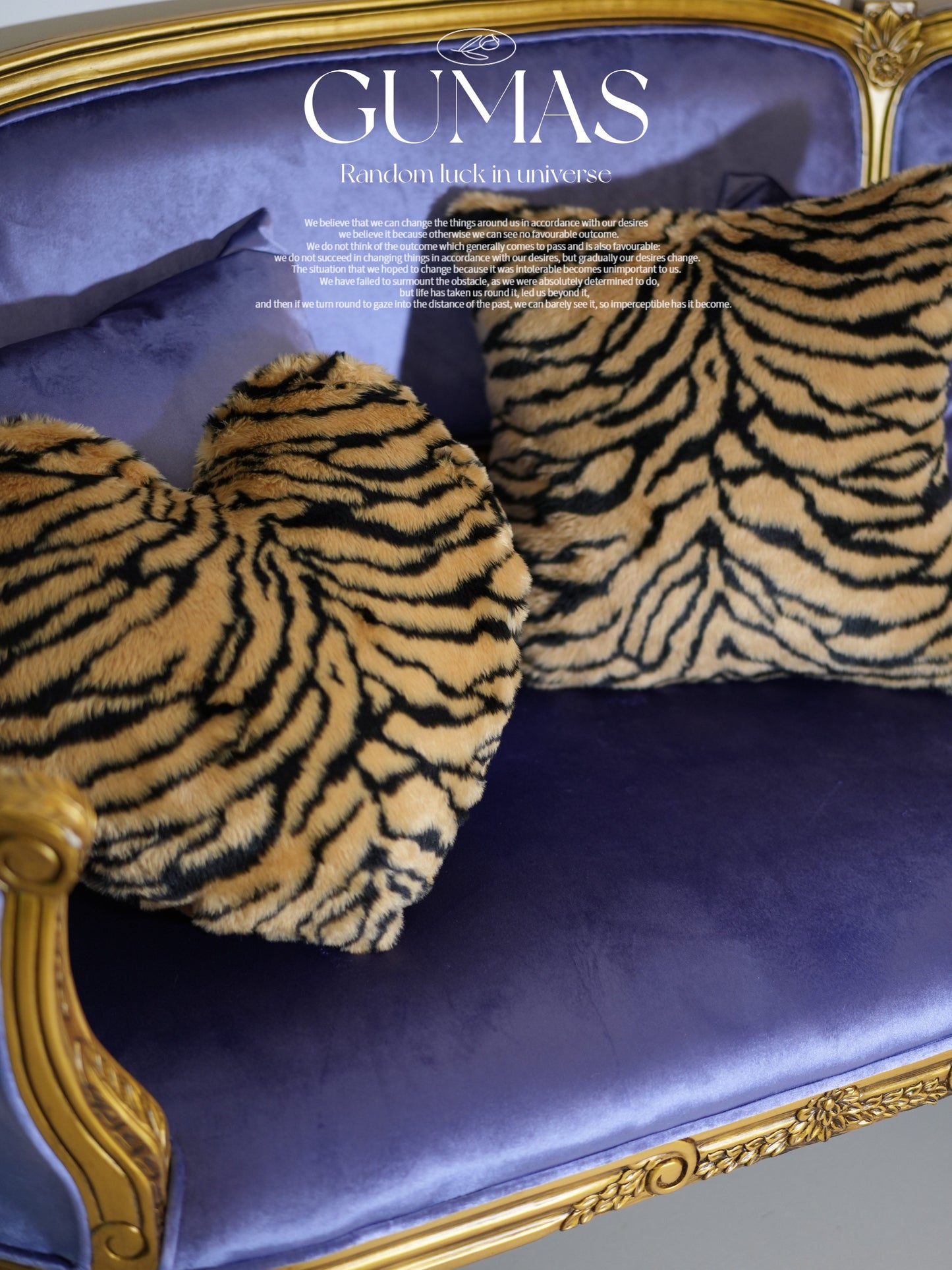 Close-up of tiger stripe plush velvet texture showing furry pile detail in gold and black
