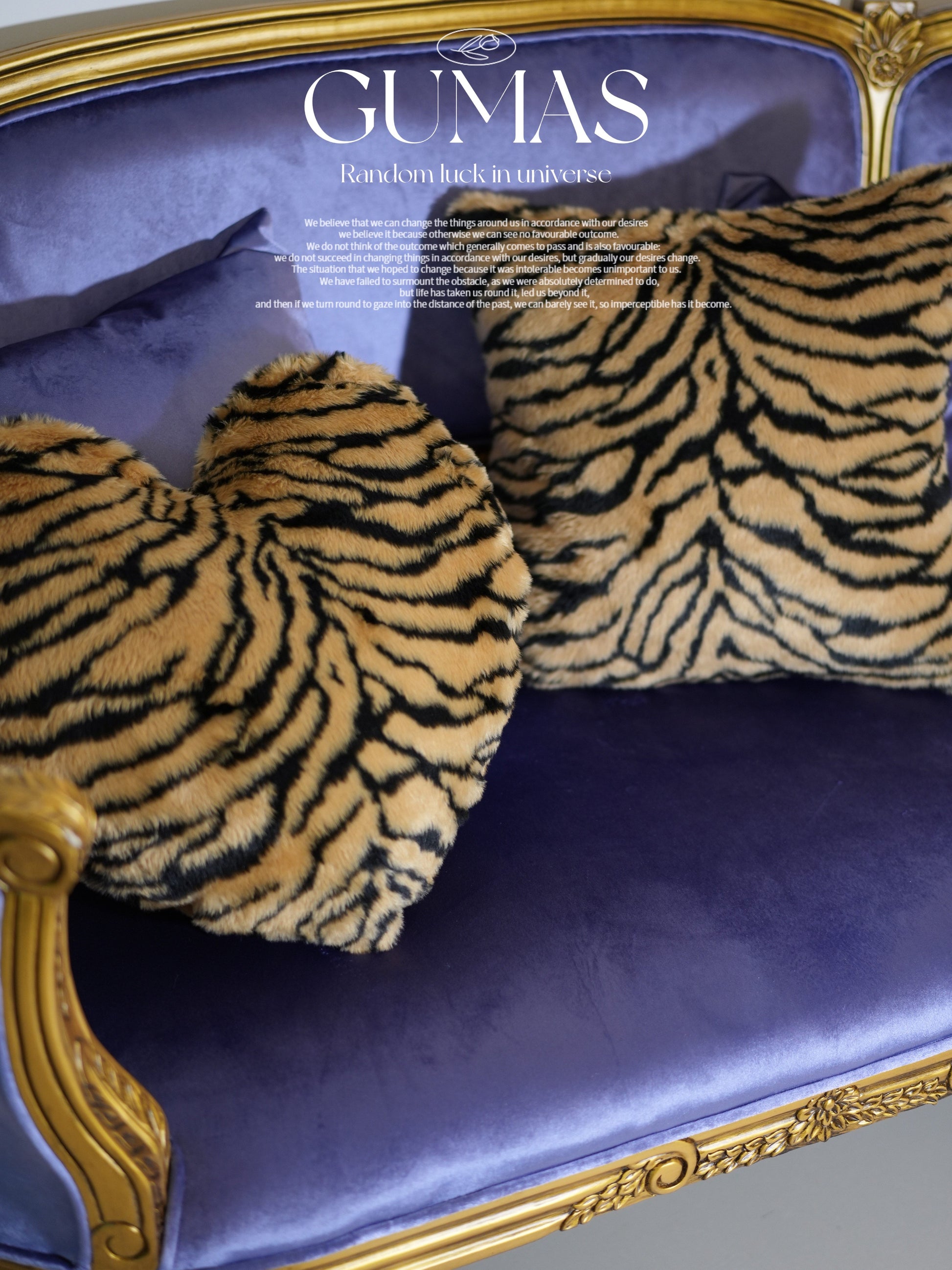 Close-up of tiger stripe plush velvet texture showing furry pile detail in gold and black