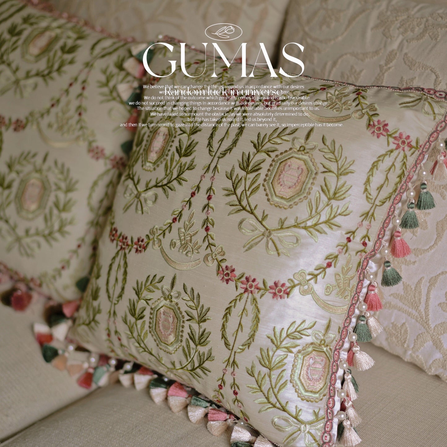 Cream botanical embroidered throw pillow with pink rose medallion and pearl-beaded tassel trim 16.5 inches