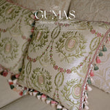 Cream botanical embroidered throw pillow with pink rose medallion and pearl-beaded tassel trim 16.5 inches