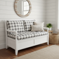 Curved loveseat in deep sapphire blue in an elegant living room setting.