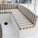 Custom beige striped boat cockpit cushions for yacht bench seating