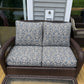 Custom blue damask wicker loveseat cushions for an outdoor patio