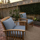 Custom blue-gray outdoor chair cushions for wood patio chairs