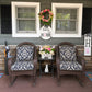 Custom navy damask wicker rocking chair cushions for a front porch