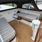 Custom striped boat cockpit cushions for a yacht seating area