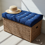 Deep seating outdoor set featuring rich navy cushions and patterned throw pillows, set in a chic backyard