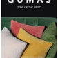 Forest green faux fur cushion cover styled with teal and coral accent pillows