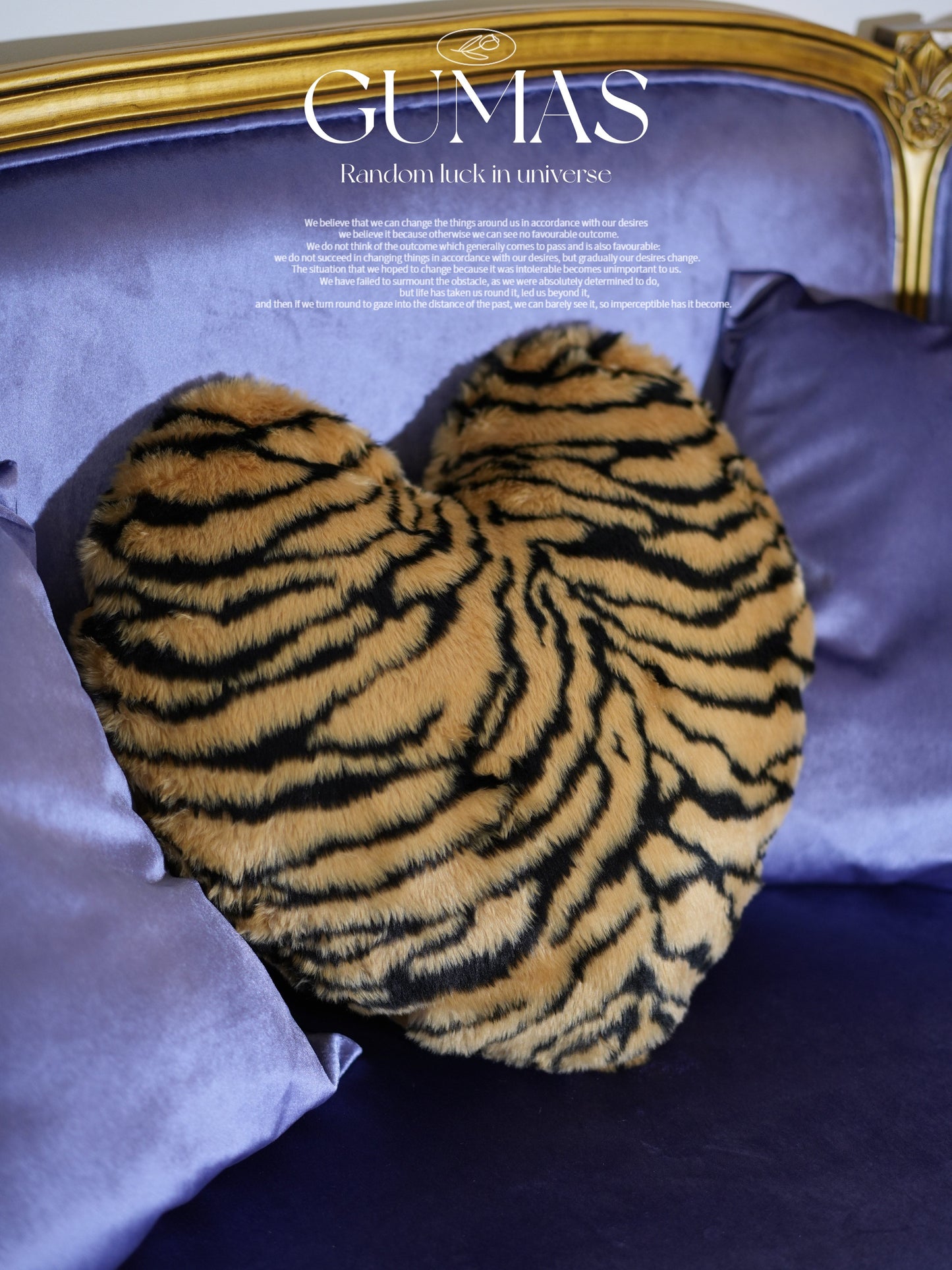 Heart shaped tiger stripe pillow 18x22 inches on vintage upholstered furniture