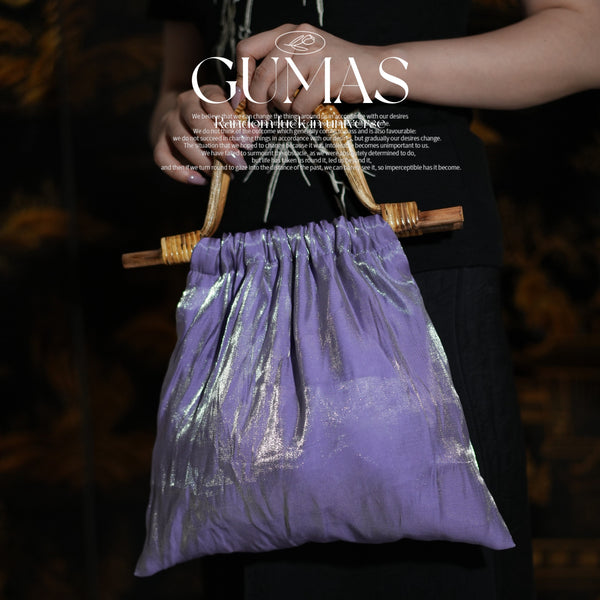 Lavender purple metallic evening bag with bamboo handles and iridescent geometric pattern