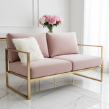 Deep jewel-toned loveseat cushions adding elegance to a cozy living room