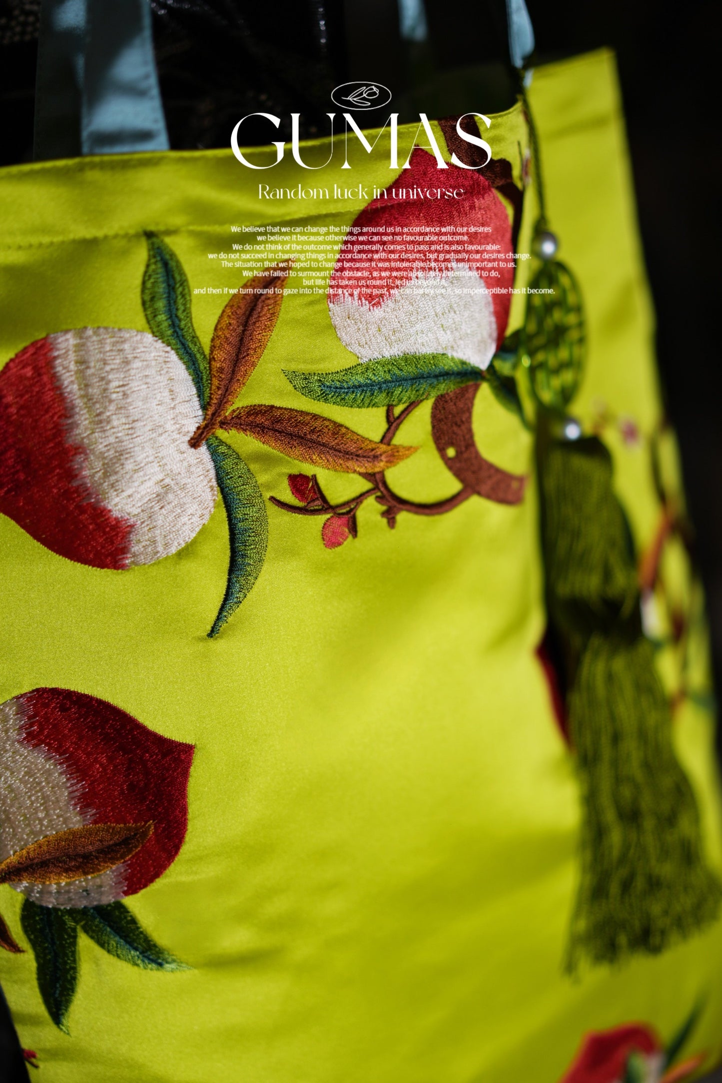 Luxury silk gift pouch in bright green with traditional Chinese floral embroidery