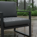 Deep seat cushions on outdoor chairs in a lush garden