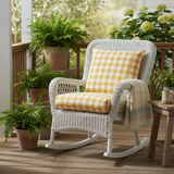 Outdoor deep seat cushions in navy blue and forest green on a stylish patio.