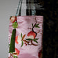 Pink and green silk embroidered pouches with optional tassel trim detail