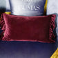 Ruffled velvet cushion cover in olive green showing dimensional edge detail